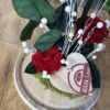 Cúpula de cristal con rosa preservada roja